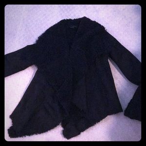 Black faux fur and faux leather jacket